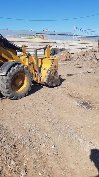 Услуги экскаватора погрузчика