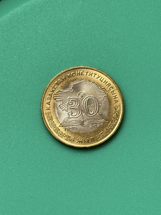 Монета 100теңге.
