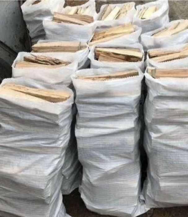 Дрова в мешках пиленые