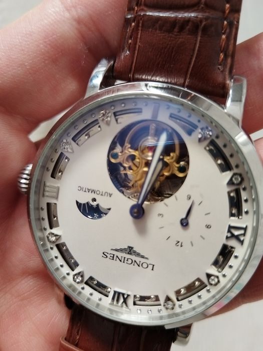 Часы новые завадные