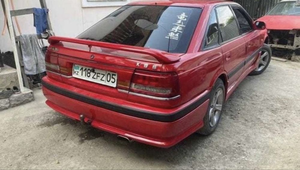 Бампер, пороги Мазда 626 GD 87-93