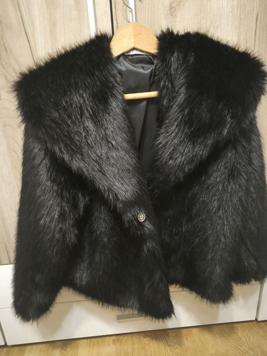 Чисто ново палто