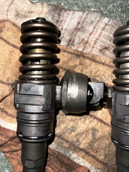 Injectoare Passat B6  1.9 BLS
