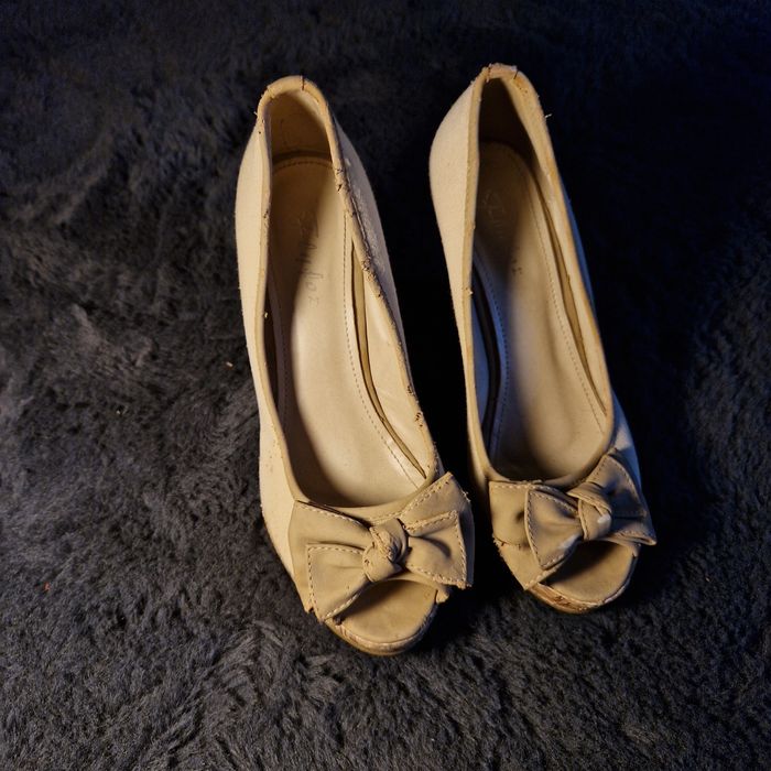 Papuci cu toc eleganti