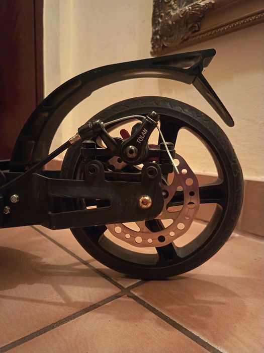 Trotineta copii cu suspensii fata spate frane pe disc putin folosita