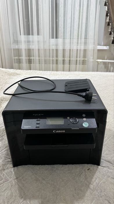 Это модель Canon i-SENSYS MF4410
