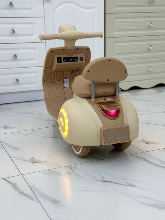 Детский электроскутер, мотоцикл.
Мотоцикл