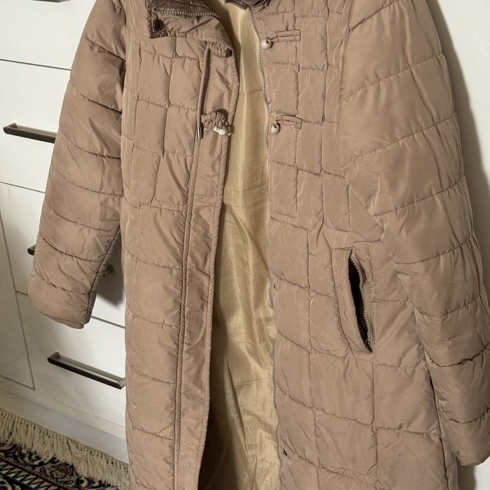 Kurtka qishki ayollar va qilar uchun