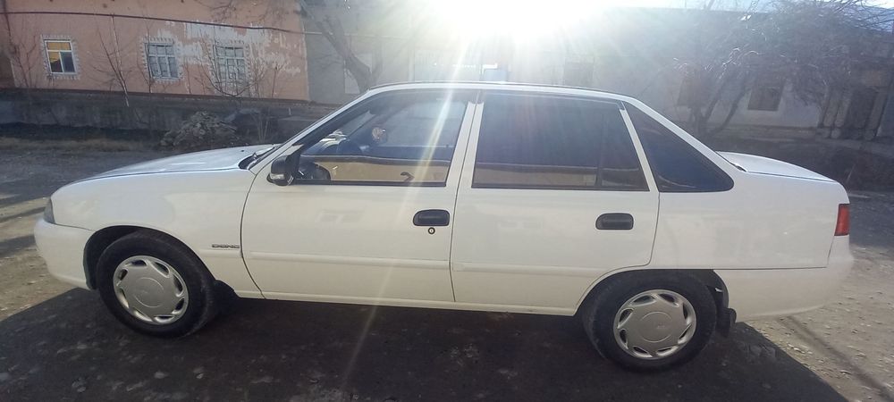 Neksi 2 rangi oq 1.6 xolati zur