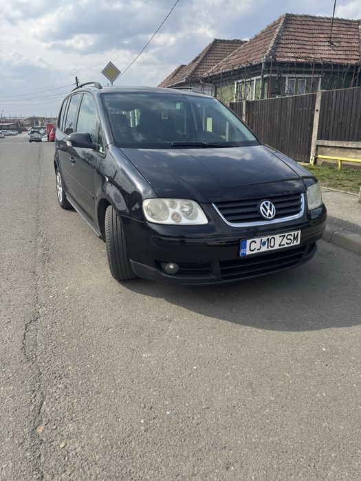 Vând touran DSG sau schimb