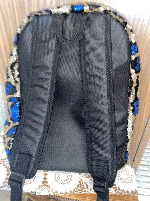 Дамска ефектна раница