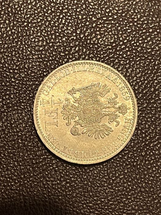 Vand moneda de argint