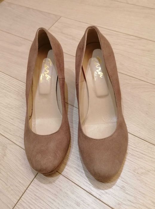 Елегантни естествена кожа практически нови