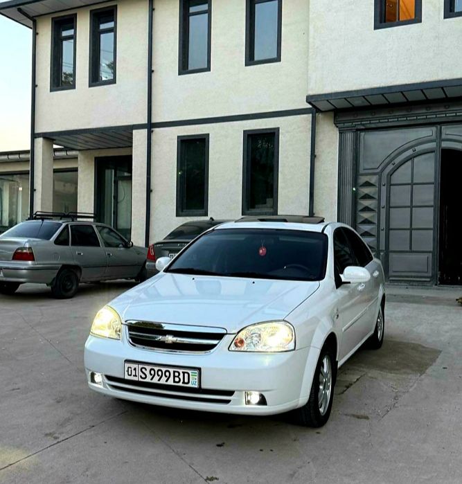 Ласетти 1,6 автомат 2013. Бензин.
