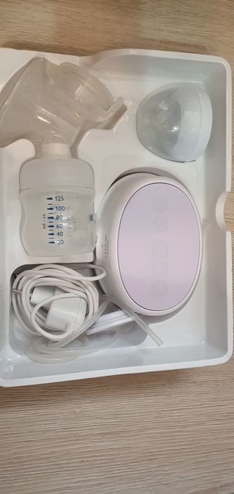 Электрический молокоотсос