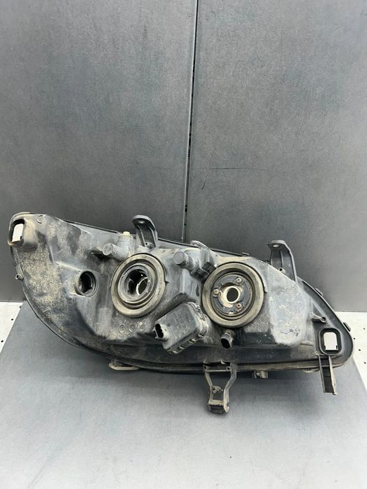 Far stanga 89100054 Opel Zafira 2003 1.6 MT (101 hp)