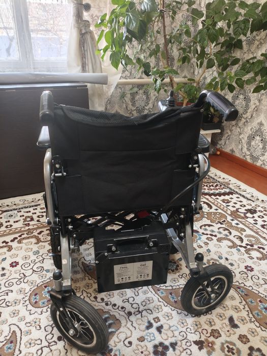 Электрическая инвалидная коляска