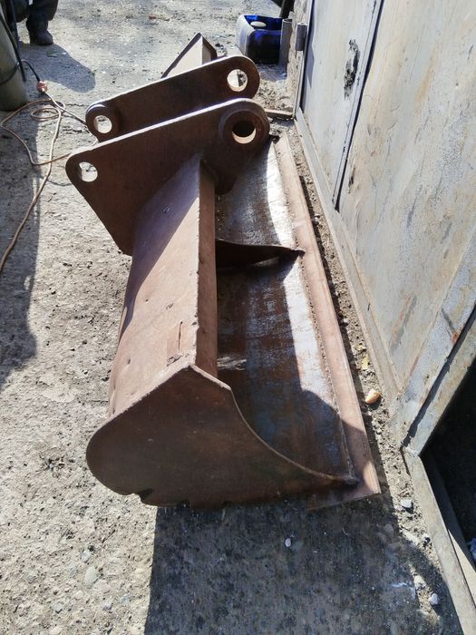 vand cupa taluz buldoexcavator caterpillar