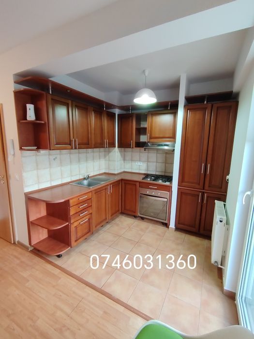Închiriez apartament cu 2 camere + loc de parcare