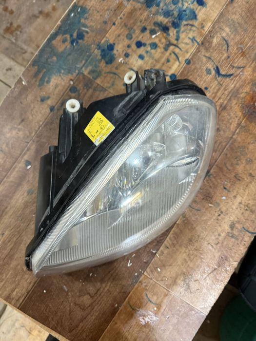 Фара приора 1 левая оригинал бош
