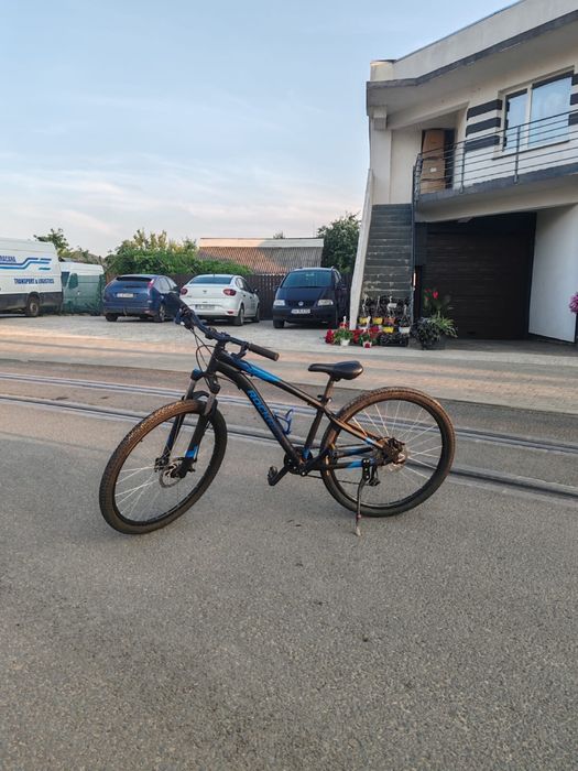 Bicicletă MTB Rockrider 27.5” – cadru M, 9 viteze, frâne pe disc – 800 lei
