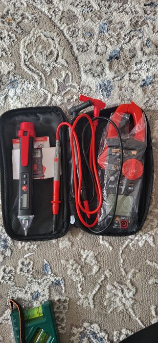 Продам мультиметр клещ и ручку тестер за 8000 тг.