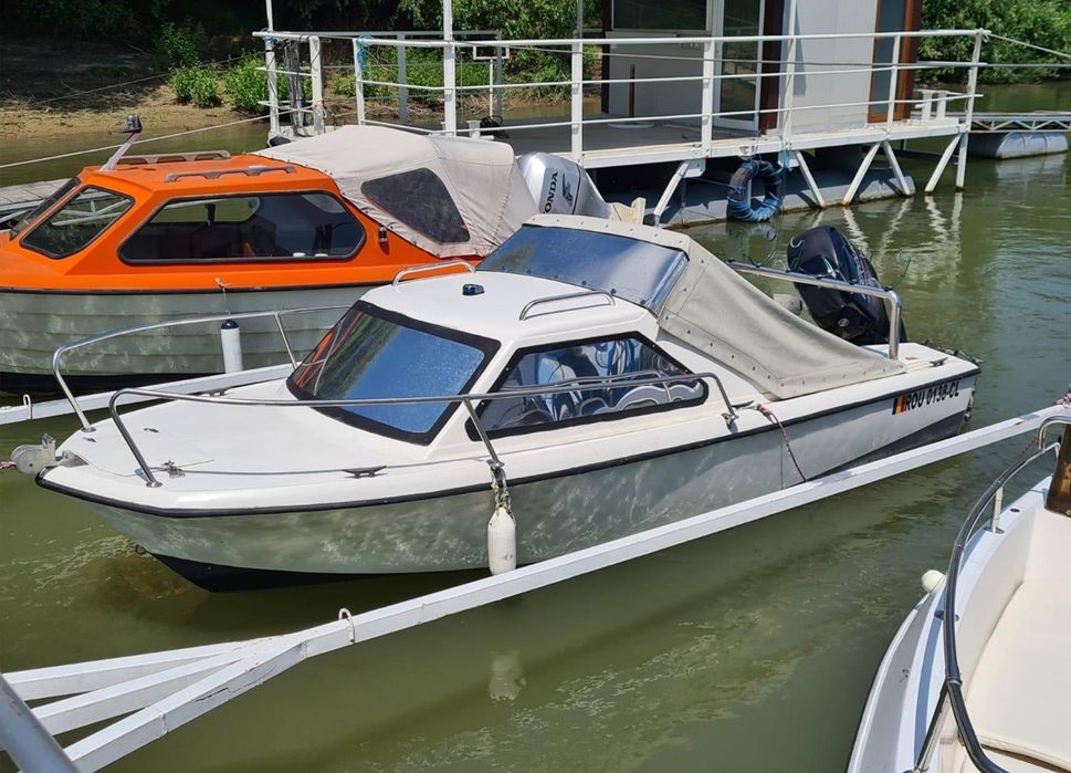 Ansamblu  barcă  + motor + peridoc