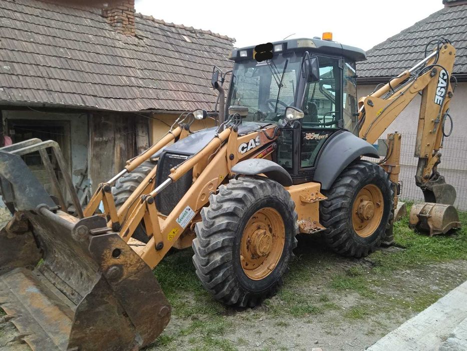 Vând Buldoexcavator Case 695 SR