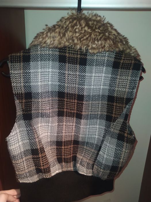 Теплая безрукавка