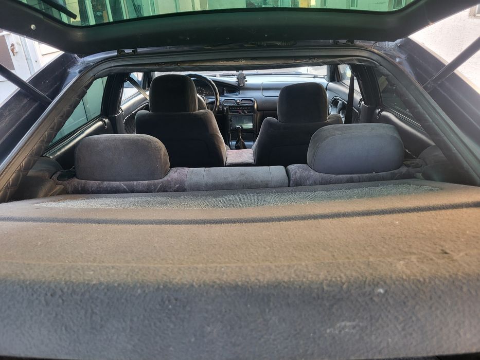 Автомобиль мазда кронос