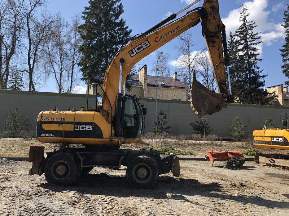 Экскаватор в аренду, заказ экскаватора, услуги эксковатора.