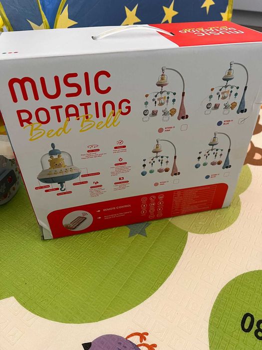 Carusel muzical pătuț LittleDomi cu telecomandă, rotire, lumini-ca nou