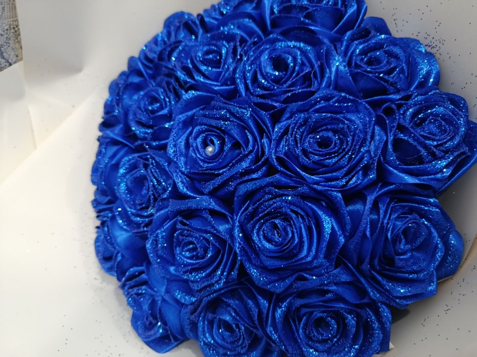 К,у́л мехнати Билан ясалган сун'ий гуллар .Донаси 30.000 /Букети 150.