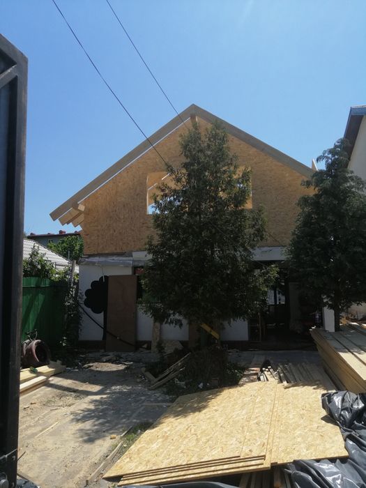 Mansarda tigla metalica ceramica acoperis velux