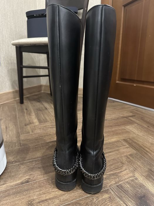 Продам кожанные сапоги