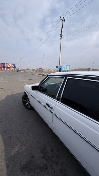 Мерседес Е.123 бензин -газ2,3л