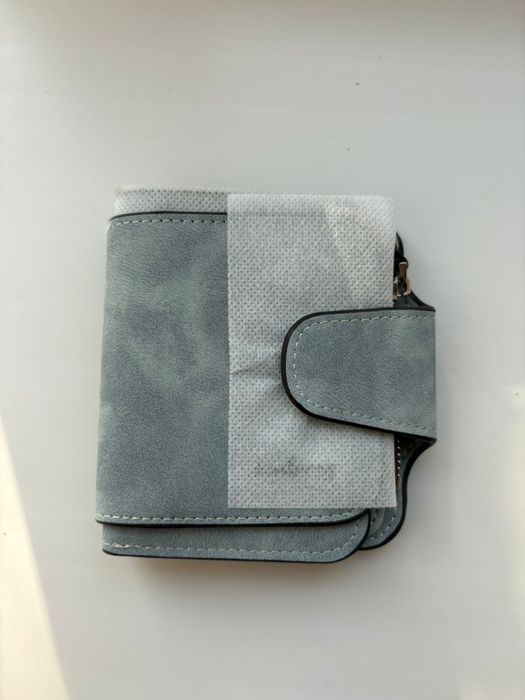 Продам кошельки Baellerry новые.