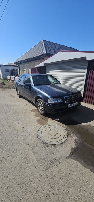 Мерседес Бенц с 200