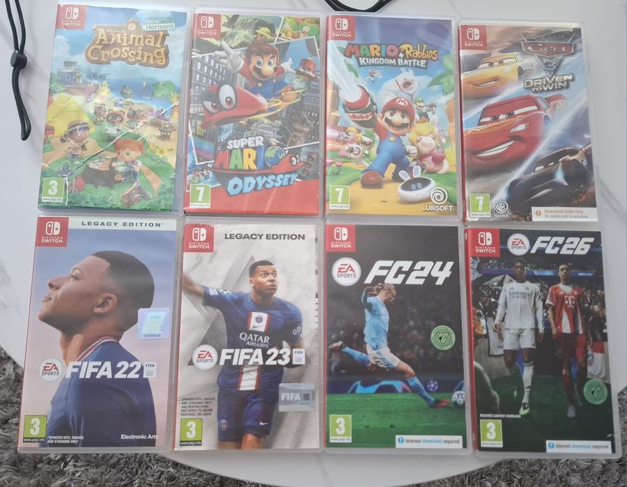 Nintendo switch + 2 джойстика + 8 игри