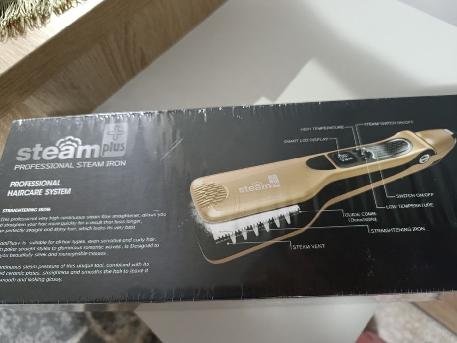 Placă de îndreptat părul cu aburi