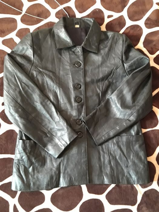 Пиждак кожанный женский. Размер (М) 48. В отличном состоянии.
