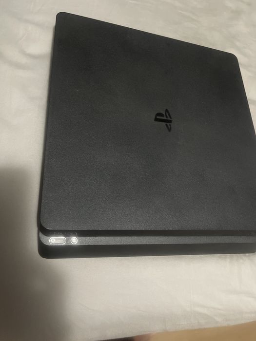 PS4 Slim pachet cu 13 jocuri