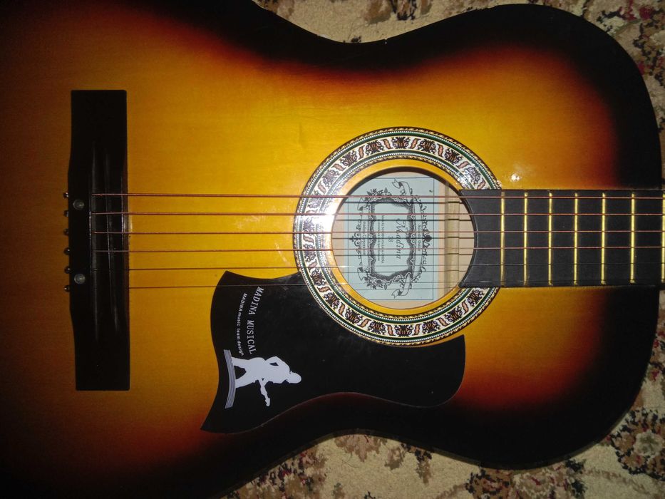 Акустическая гитара