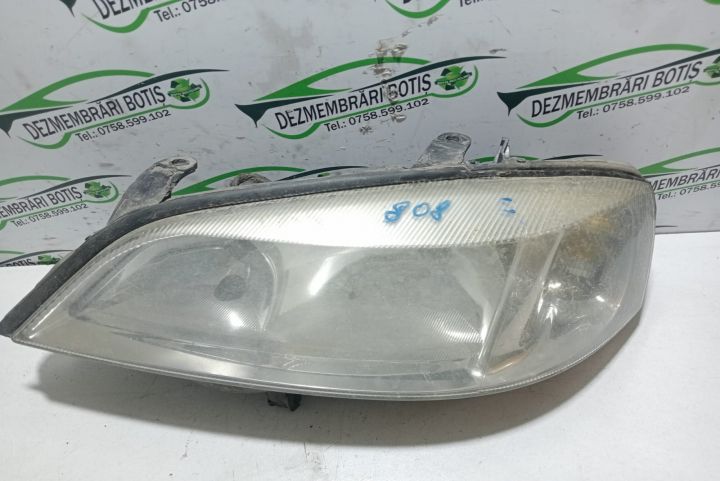 Far stanga Opel Astra G