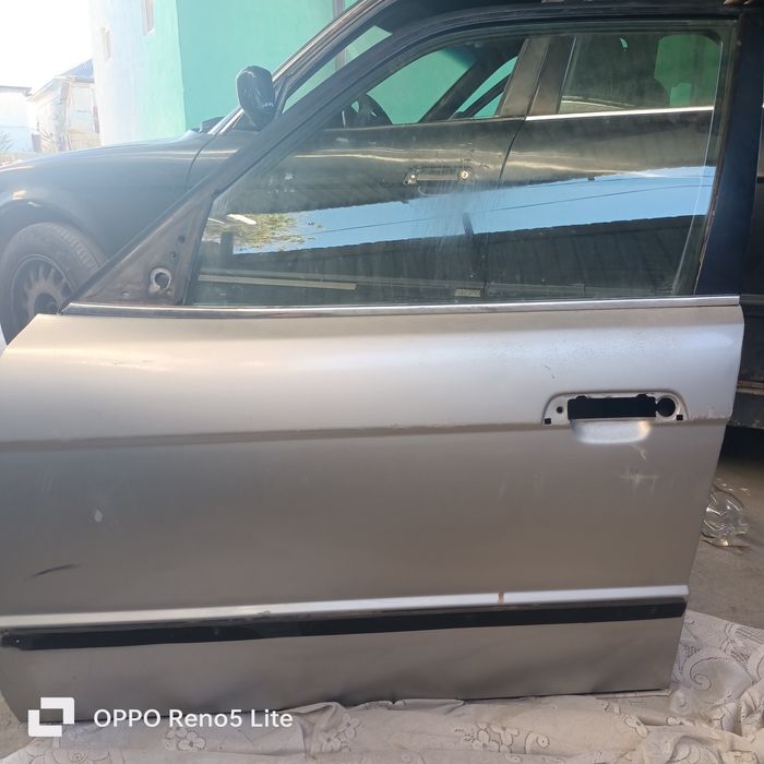 Продам шына новый и дверь BMW e-34