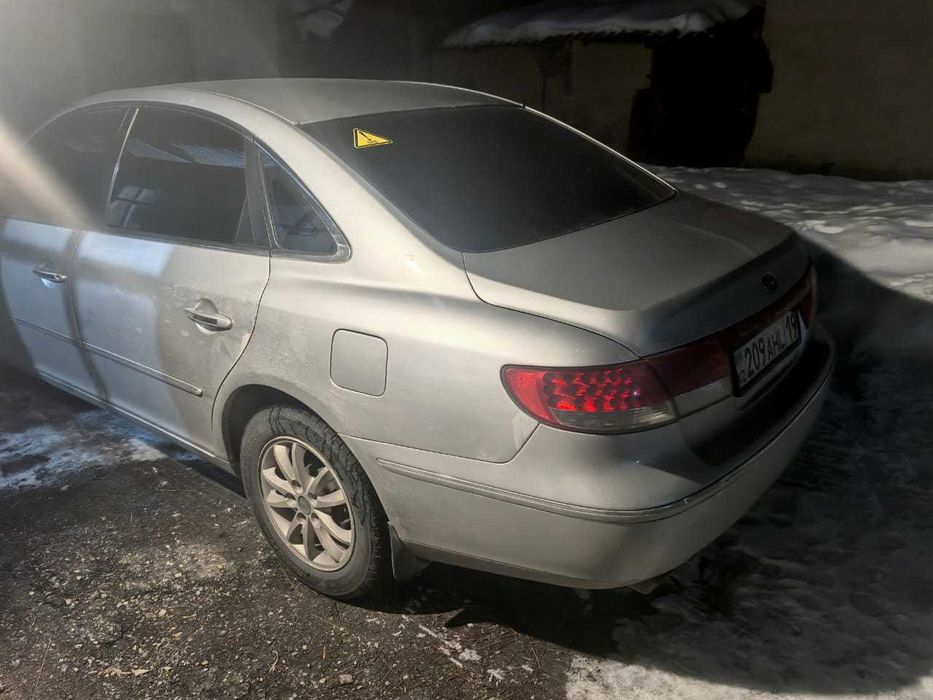 Грандеур 2009 газ