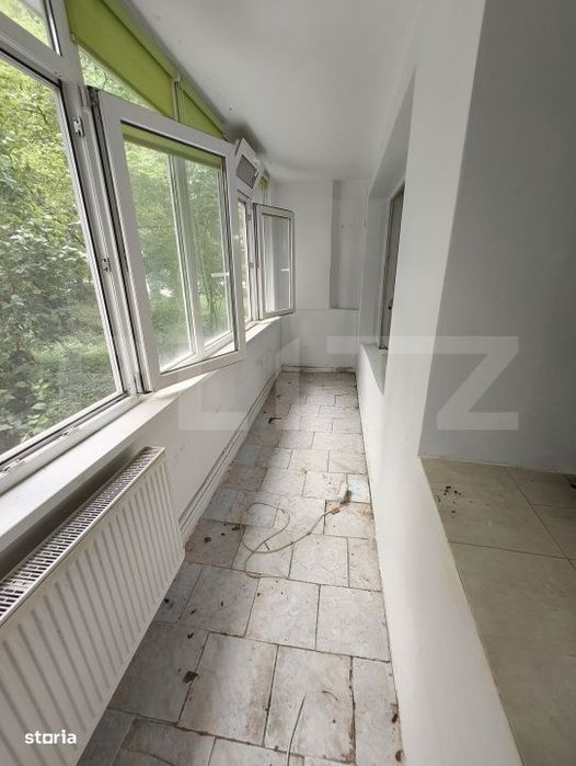 Apartament cu 2 camere la parter- nerenovat, 60 mp, zona Centru