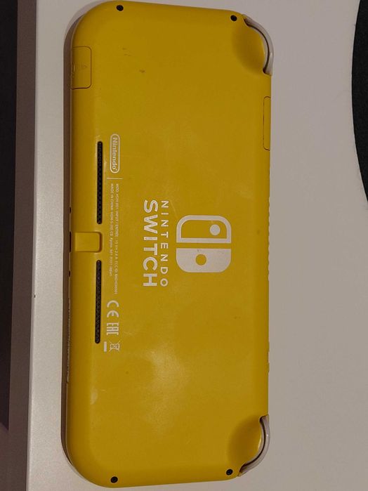 Vand Nintendo Switch Lite in stare foarte buna cu 8 jocuri, husa