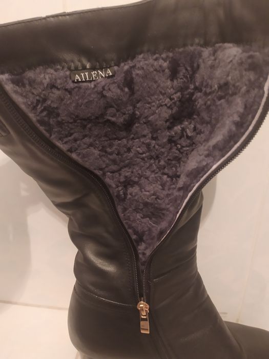 Продам женские сапоги