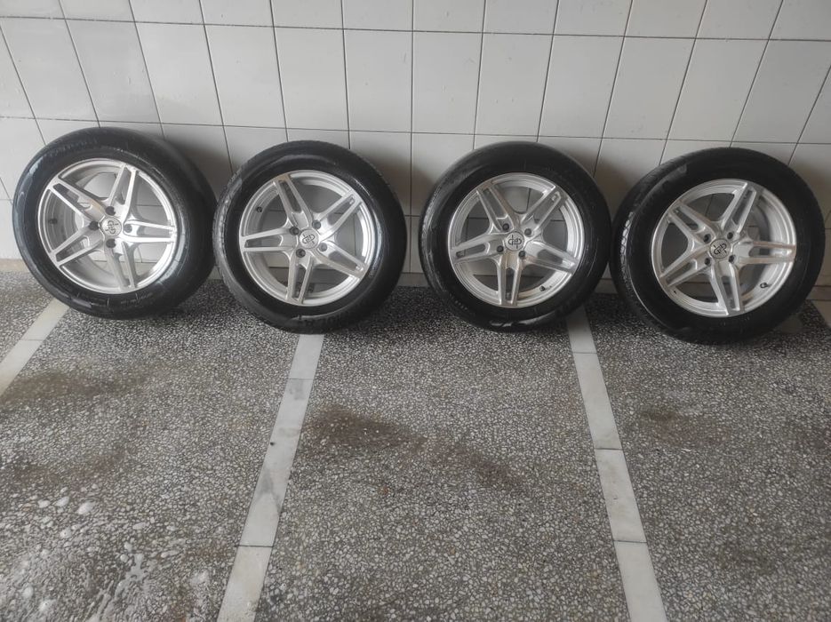 Продам титановые диски с резиной